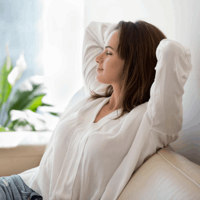Woman with allergies breathing better after having sofa cleaned by Ecosuds