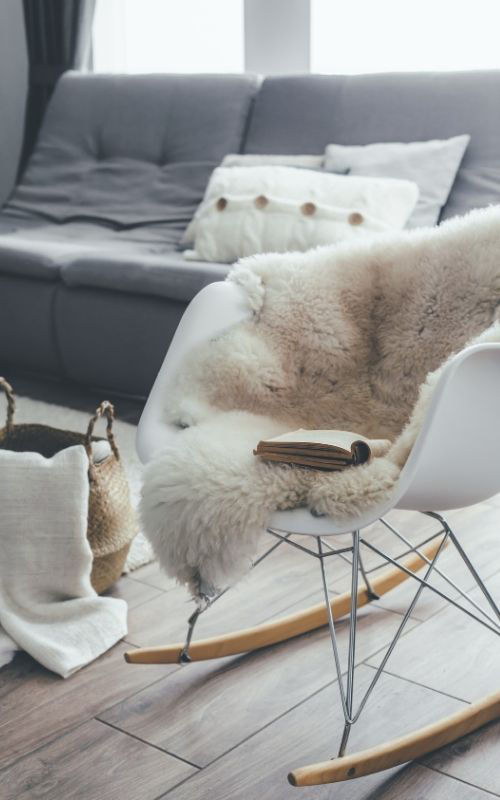 Sheep skin area rug on chair cleaned by Ecosuds Burlington Ontario